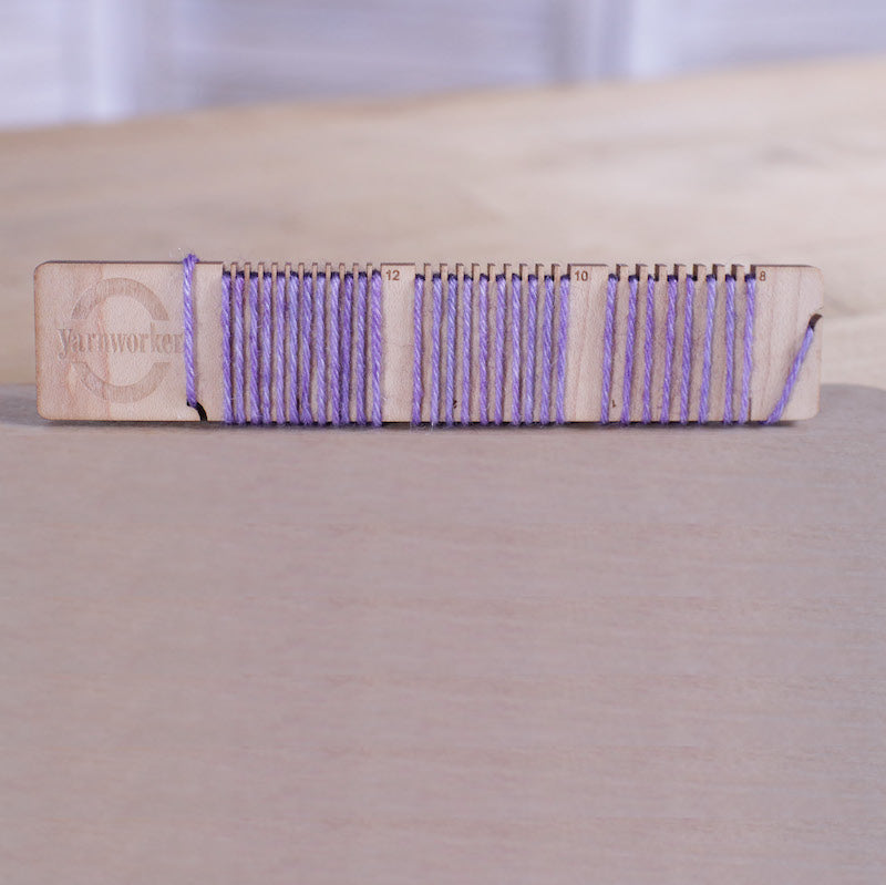 sett checker with a DK weight yarn winding