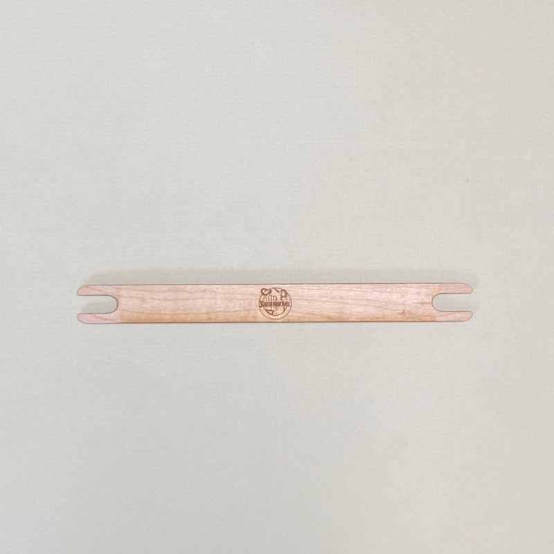 Old School Yarnworker logo engraved on maple