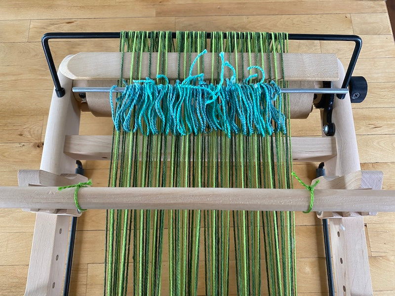 Single heddle variation warped with a pick-up stick and heddle rod on a Kromski  Presto.