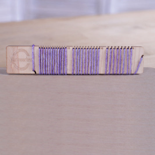 sett checker with a DK weight yarn winding