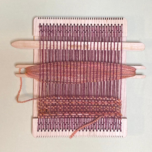 shuttle in a loom shown at full width